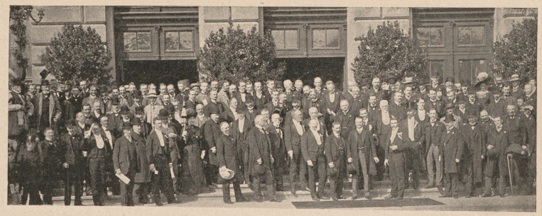 A group photo taken at the entrance to the Polytechnic