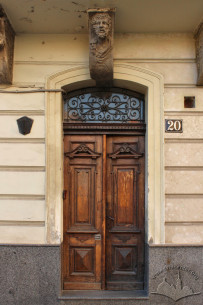 Vul. Halytska, 20. The main entrance with woodwork dating to 2nd half of 19th c.