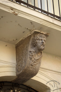Vul. Halytska, 20. One of the balcony consoles, carved in white stone