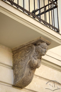 Vul. Halytska, 20. One of the balcony consoles, carved in white stone