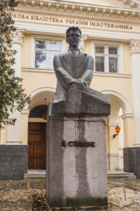 Vasyl Stefanyk monument. On the background, the library building