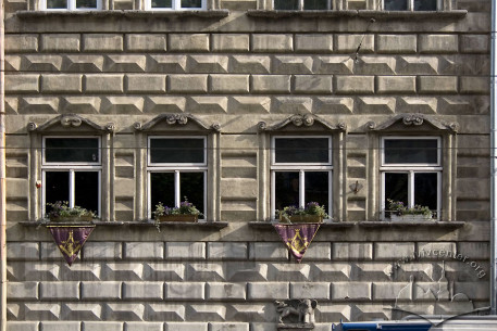 Pl. Rynok, 14. Part of the main facade (2nd floor level)