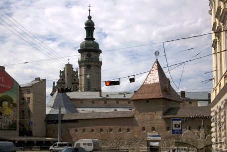 A view from pl. Mytna. Church with it's tower are seen above the former convent fortifications