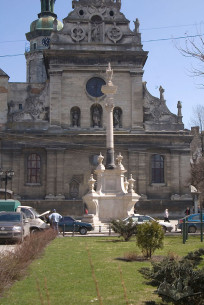 Pl. Soborna, 3. The church building's principal facade. Former column of st. Jan of Dukla is on the front