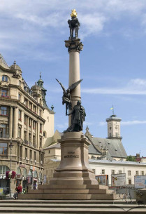 Adam Mickiewicz monument. On the background, Latin Cathedral
