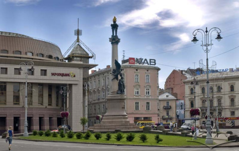 Mickiewicz monument. On the background, buildings on pl. Mitskevycha, 10; vul. Valova, 2; and pl. Halytska, 15