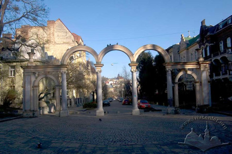 Stryiskyi Park:  main entrance arcade and view of Parkova Street