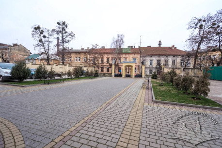 Courtyard in front of the prayer hall, on the background, the housing of vul. Zhovkivska