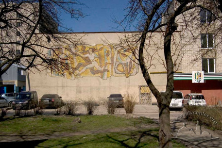 Vul. Kerchenska, 8, 8. The Budivelnyk palace of sports building's main facade decorated with mozaics.