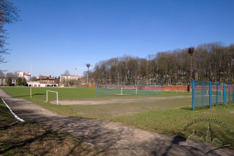 Vul. Vachnianyna, 1. The smaller field is seen on the foreground and the main football field is behind it. On the background the Lychakivskyi Cemetery can be seen.
