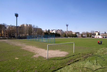 Vul. Vachnianyna, 1. A view of both training and main fields of the stadium. The buildings from Vachnianyna and Levytskoho streets are seen on the background.
