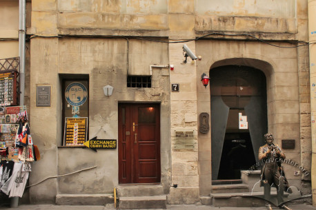 Vul. Serbska, 7. Part of the principal facade. On the left, the main entrance. On the right, entrance to the "Masoch" cafe, and a monument to Leopold von Sacher-Masoch