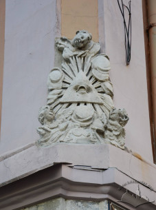 Vul. Krakivska, 1. Sculpture with "All-seeing eye" placed on the building's corner