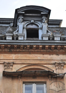 Vul. Krushelnytskoi, 13. An attic window, the decor around is made of tin