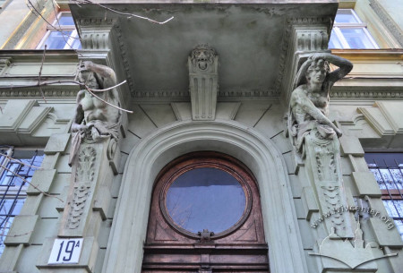 Vul. Krushelnytskoi, 19a. The lunette above the doors surrounded with atlants supporting balconies