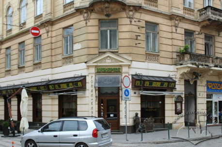 Vul. Hnatiuka, 8. Corner part of the building with an entrance to the Prague restaurant which is located here
