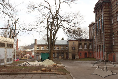 The hospital's courtyard, a view towards east. The High Castle (Vysokyi Zamok) hill is seen on the background