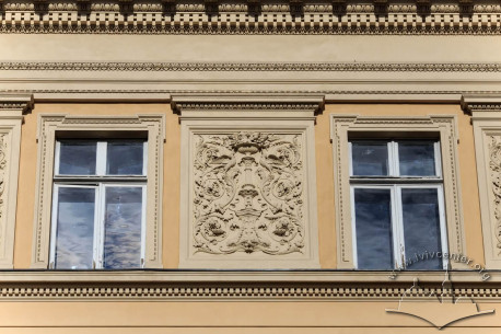 Vul. Universytetska, 1. Neo-Renaissance styled plasterwork between 3rd floor windows