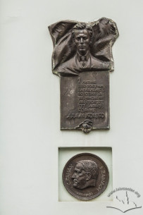 Vul. Hrushevskoho, 4. Memorial plaques on the building's main facade. On the upper one inscription says: On July 1, 1910, student Adam Kotsko died on the barricades fighting for the Lviv University. The one below is dedicated to famous mathematician Stefan Banach who worked at the University