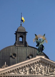 Prosp. Svobody, 28. Pediment on the top of the principal facade with a statue of Glory on it holding a palm branch