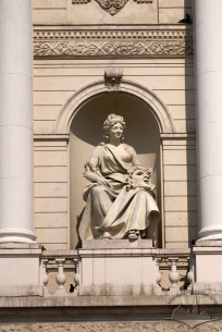 Prosp. Svobody, 28. The Comedy statue in the main facade niche