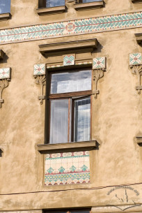 Vul. Ruska, 20. Decoration of the 3rd floor windows in Hutsul Secession style. Majolica tiles are used.