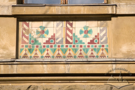 Vul. Ruska, 20. Maiolica tiles with Hutsul Secession style ornaments that are placed under the 3rd floor windows.