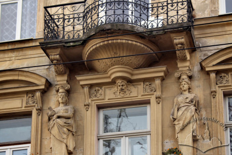 Vul. Krushelnytskoyi, 1. Vul. Krushelnytskoyi, 1. Part of the main facade. Its central axis is accentuated with balconies and rich plasterwork with female herms