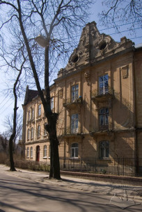 View of the principal elevation of building #24 and a part of building #22