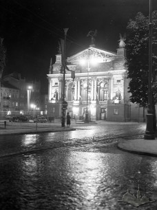 Illuminated City Theater at night.